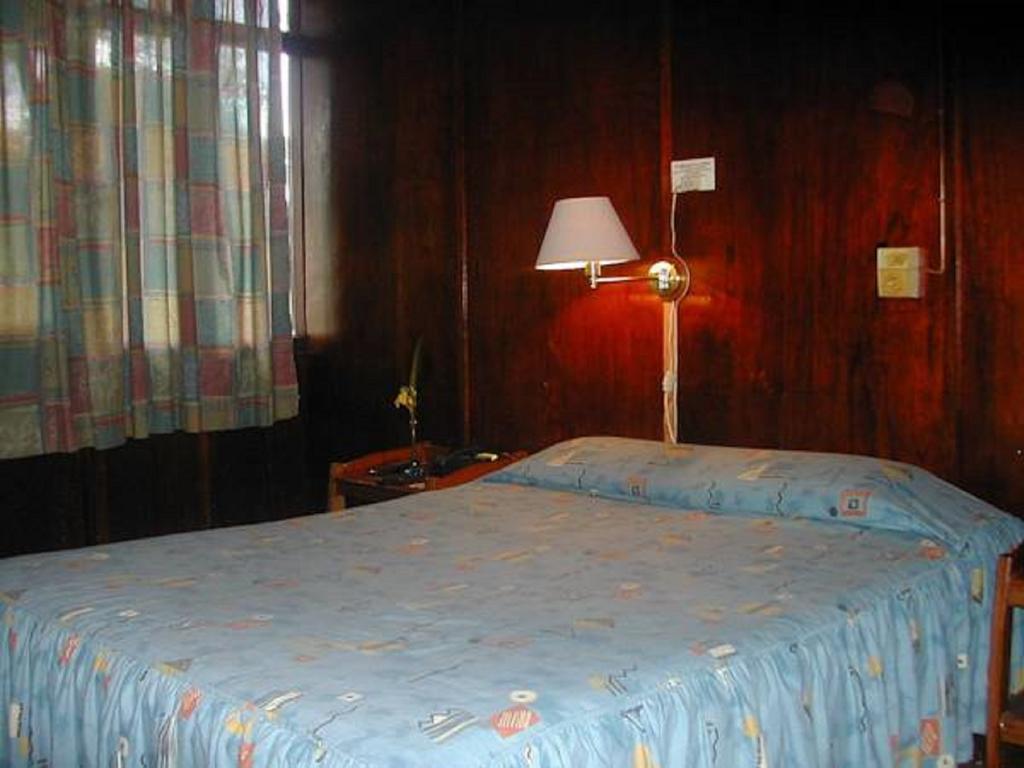Hotel Don Carlos Puerto Maldonado Szoba fotó